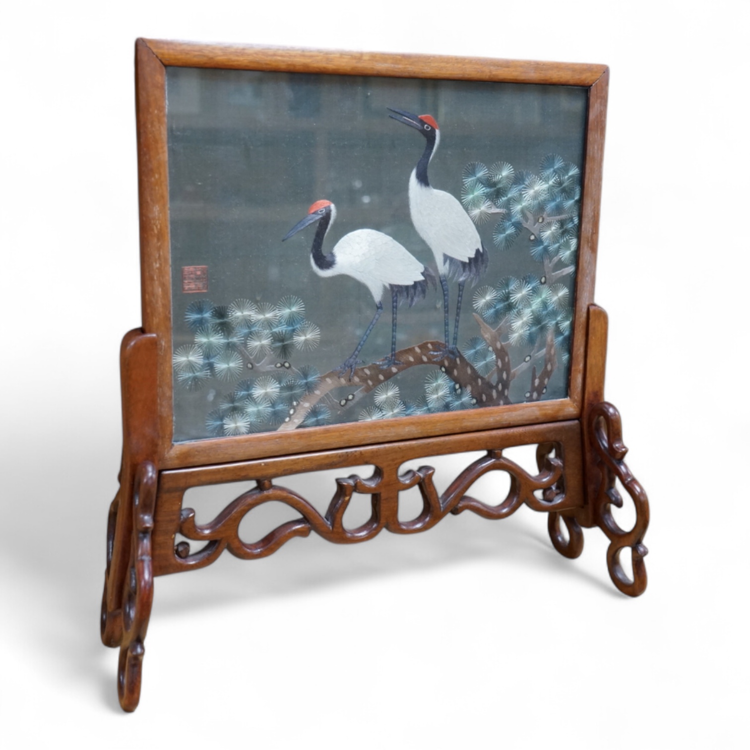 A Chinese hardwood double-sided silk table screen, 32cm tall. Condition - fair to good